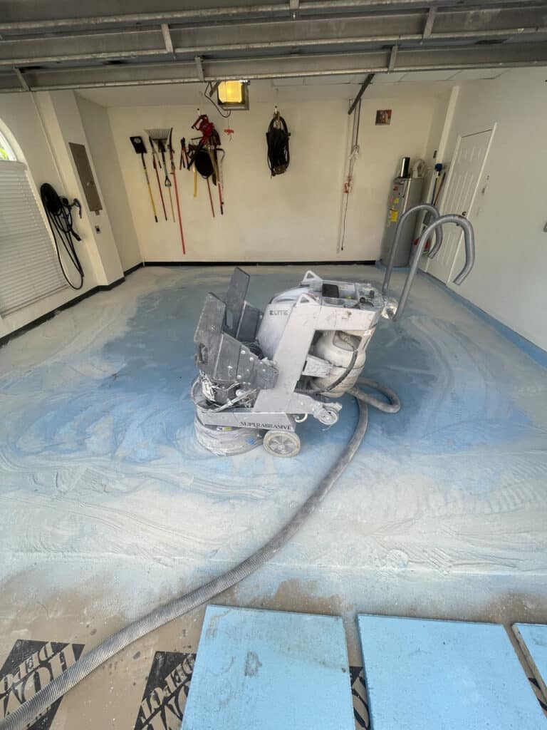 Blue epoxy installation in a garage in Delray Beach, FL